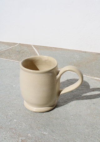 Coffee Mug in Sand